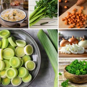 Fresh potato and leek soup mix ingredients including sliced leeks, potatoes, onion, celery and parsley ready for cooking